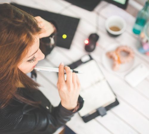 woman-hand-desk-office.jpg